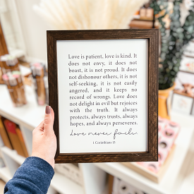 Love Never Fails Framed Wood Sign